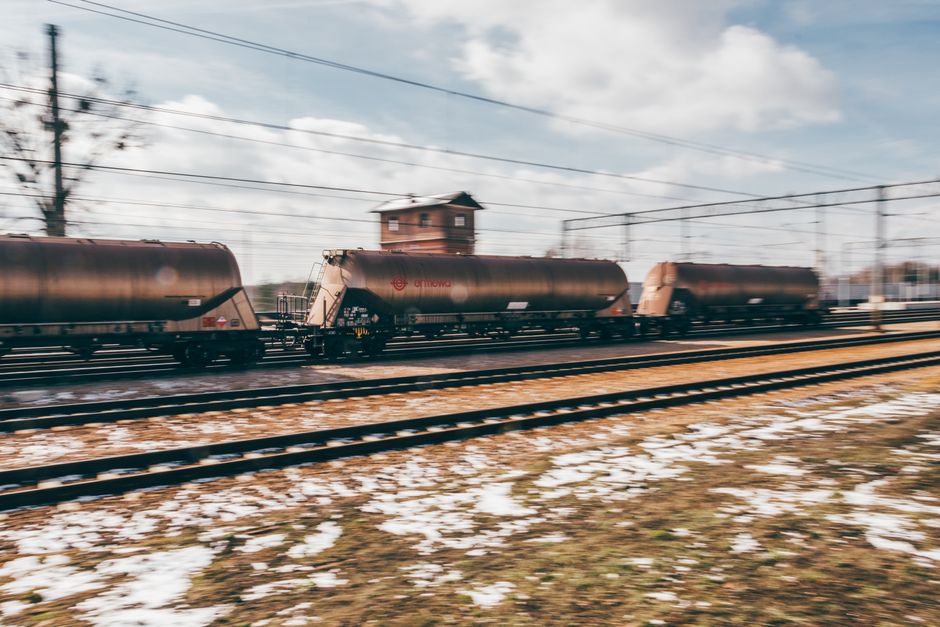 Blurred motion of a freight train passing through Trzebinia, Poland.